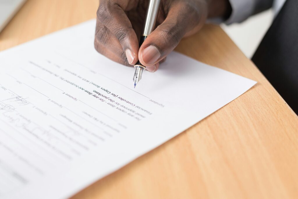 Signing documents of a house purchase in The Netherlands