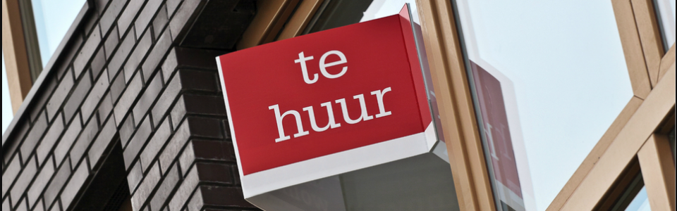 “Te Huur” sign displayed in the window of an apartment in the Netherlands